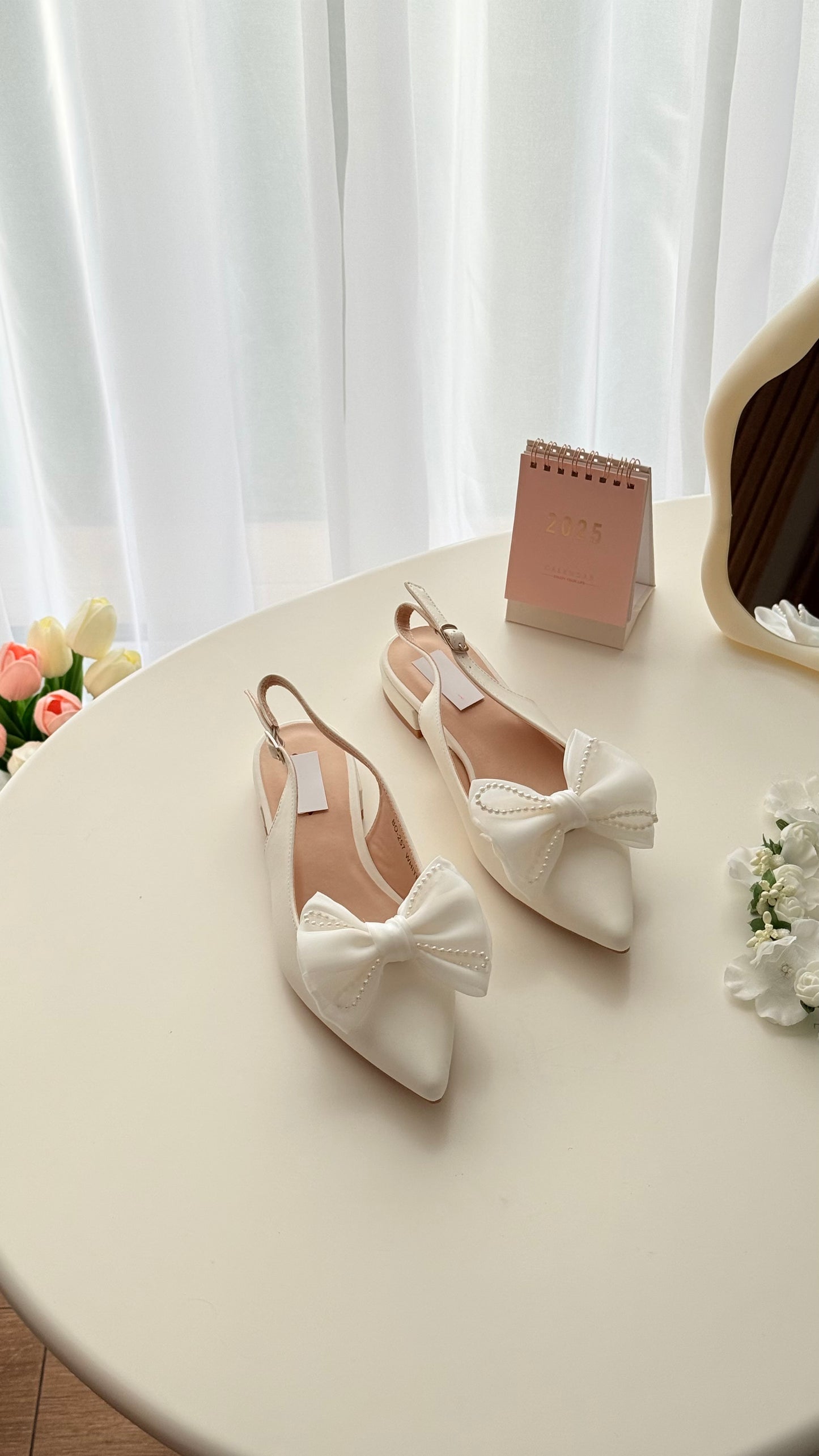 Escarpin plat papillon