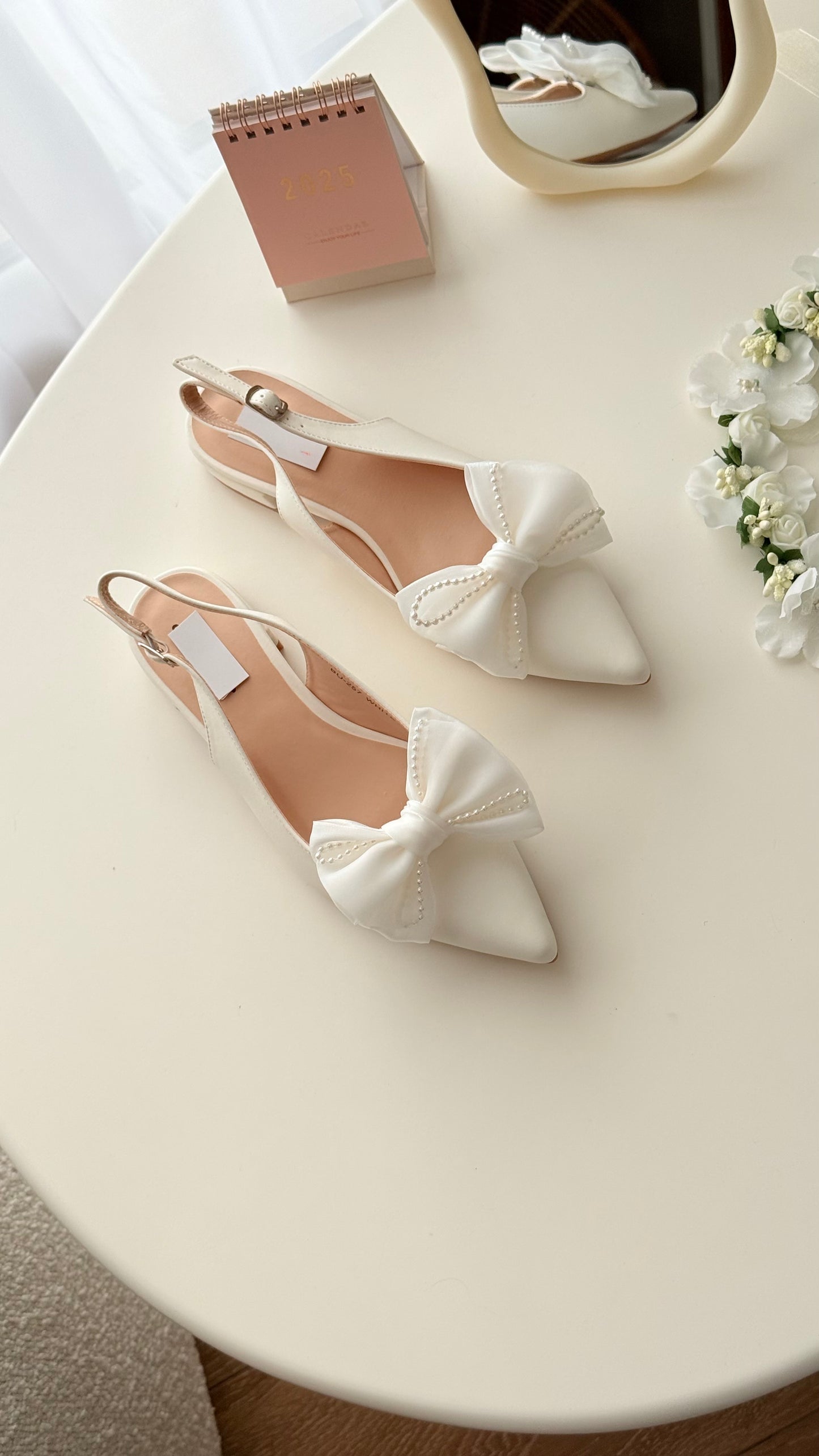 Escarpin plat papillon